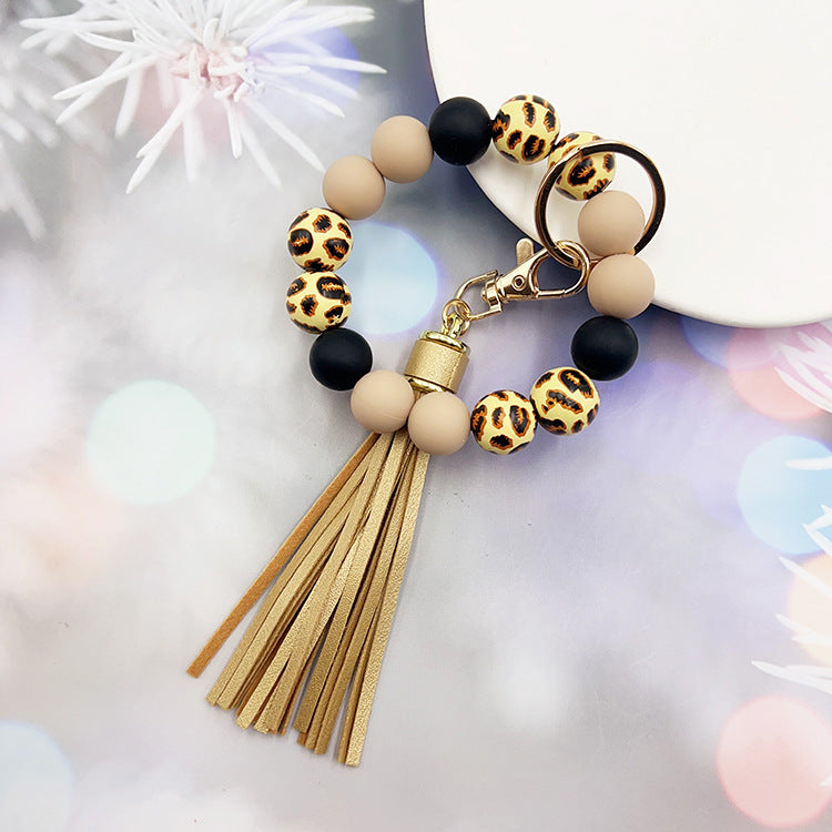 Wholesale Leopard Print Wood Beads Silicone Beaded Bracelet Tassel Key Ring